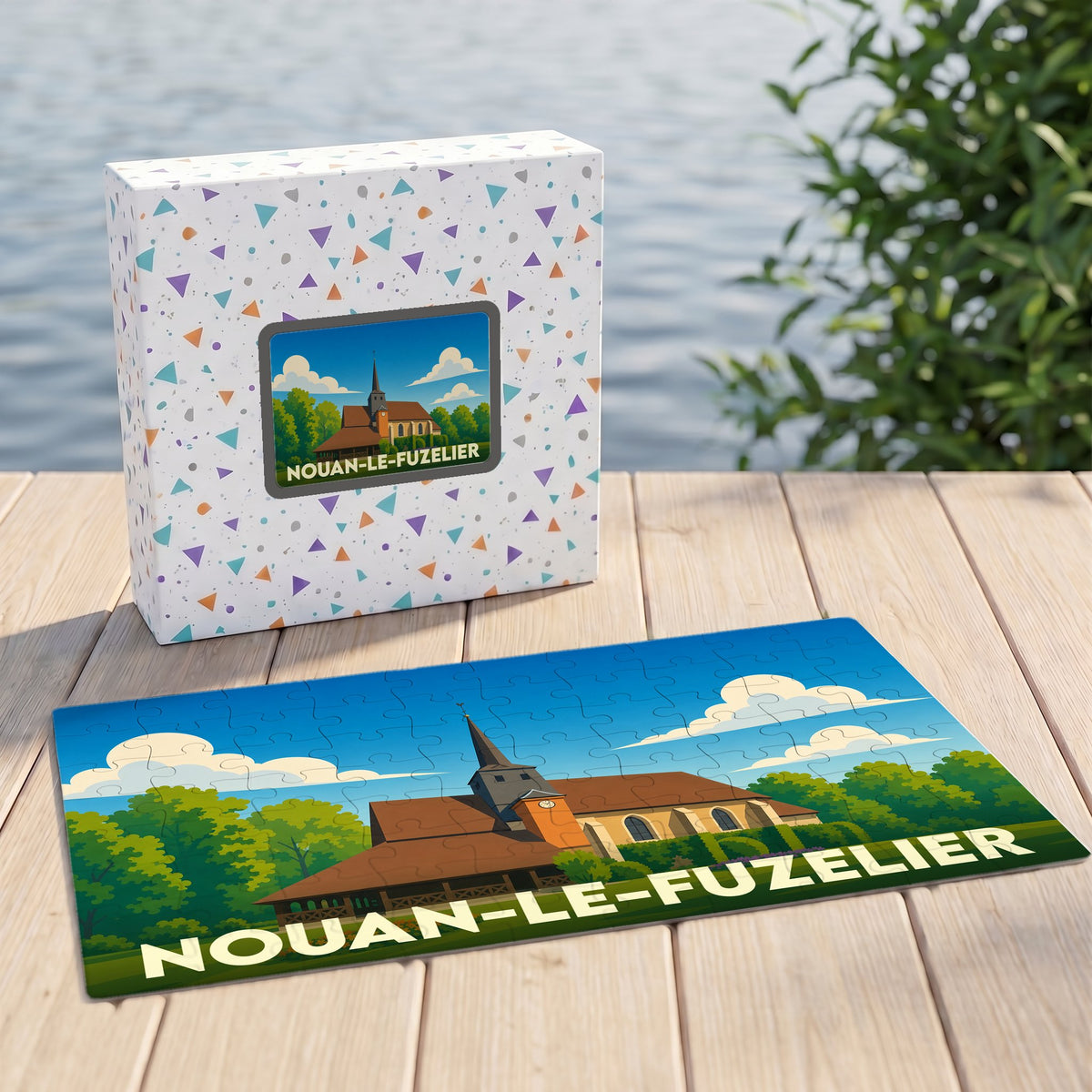 Puzzle souvenir de la ville de Nouan-le-Fuzelier avec son église illustrée dans un style graphique épuré.