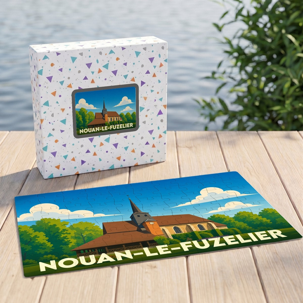 Puzzle souvenir de la ville de Nouan-le-Fuzelier avec son église illustrée dans un style graphique épuré.