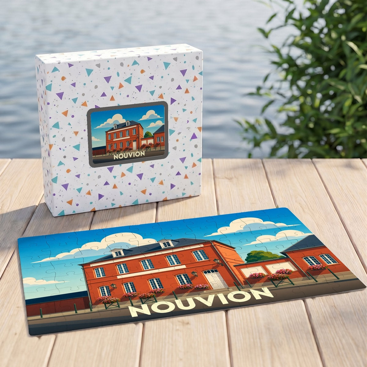 Puzzle souvenir de la ville de Nouvion avec une illustration stylisée d'un bâtiment en briques rouges.