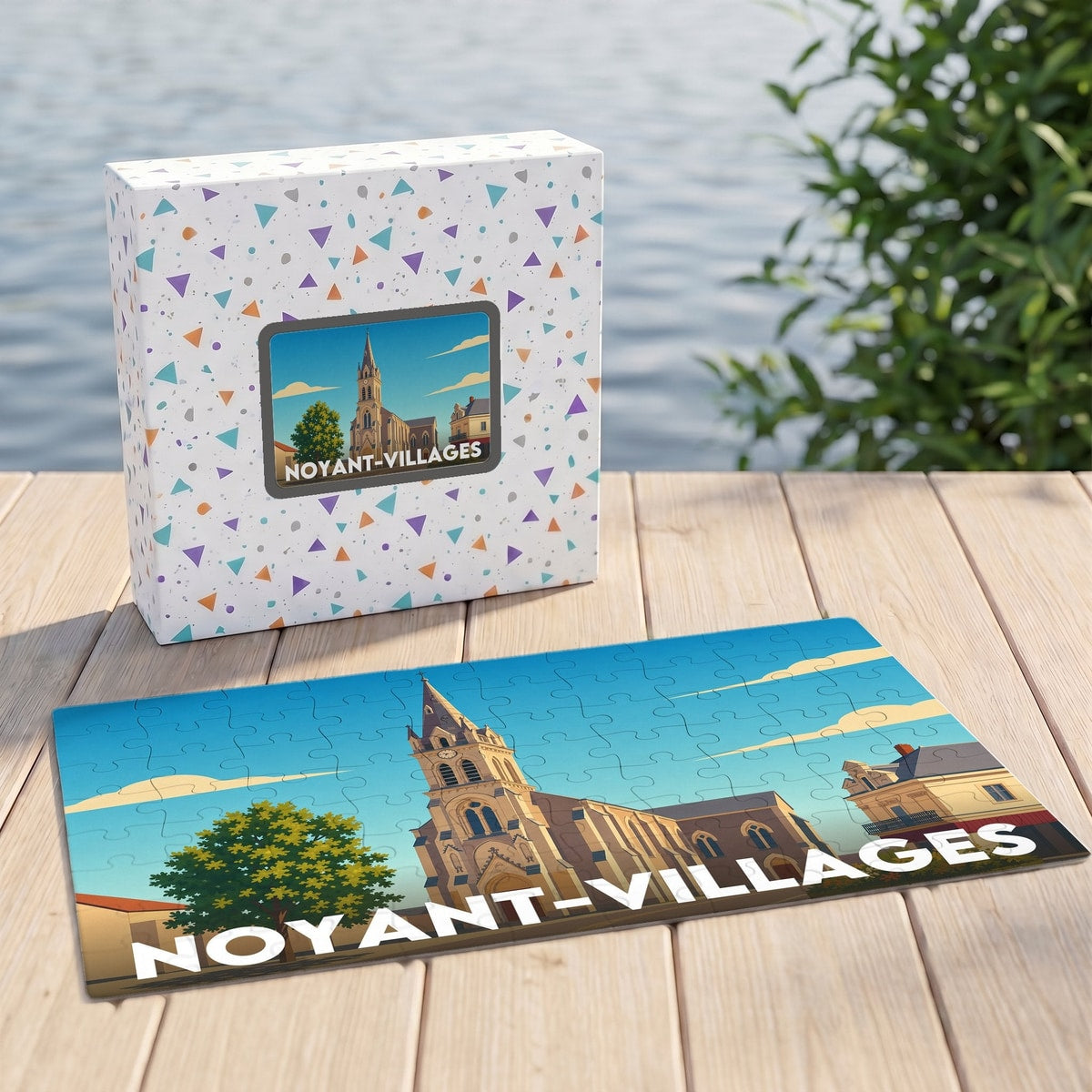 Puzzle souvenir de la ville de Noyant-Villages avec une illustration stylisée d'une église et de son village.