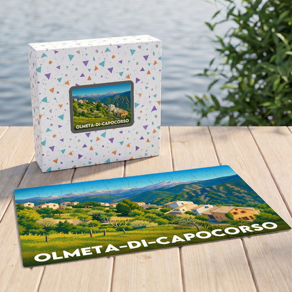 Puzzle souvenir de la ville d'Olmeta-di-Capocorso avec une illustration stylisée de son paysage vallonné.