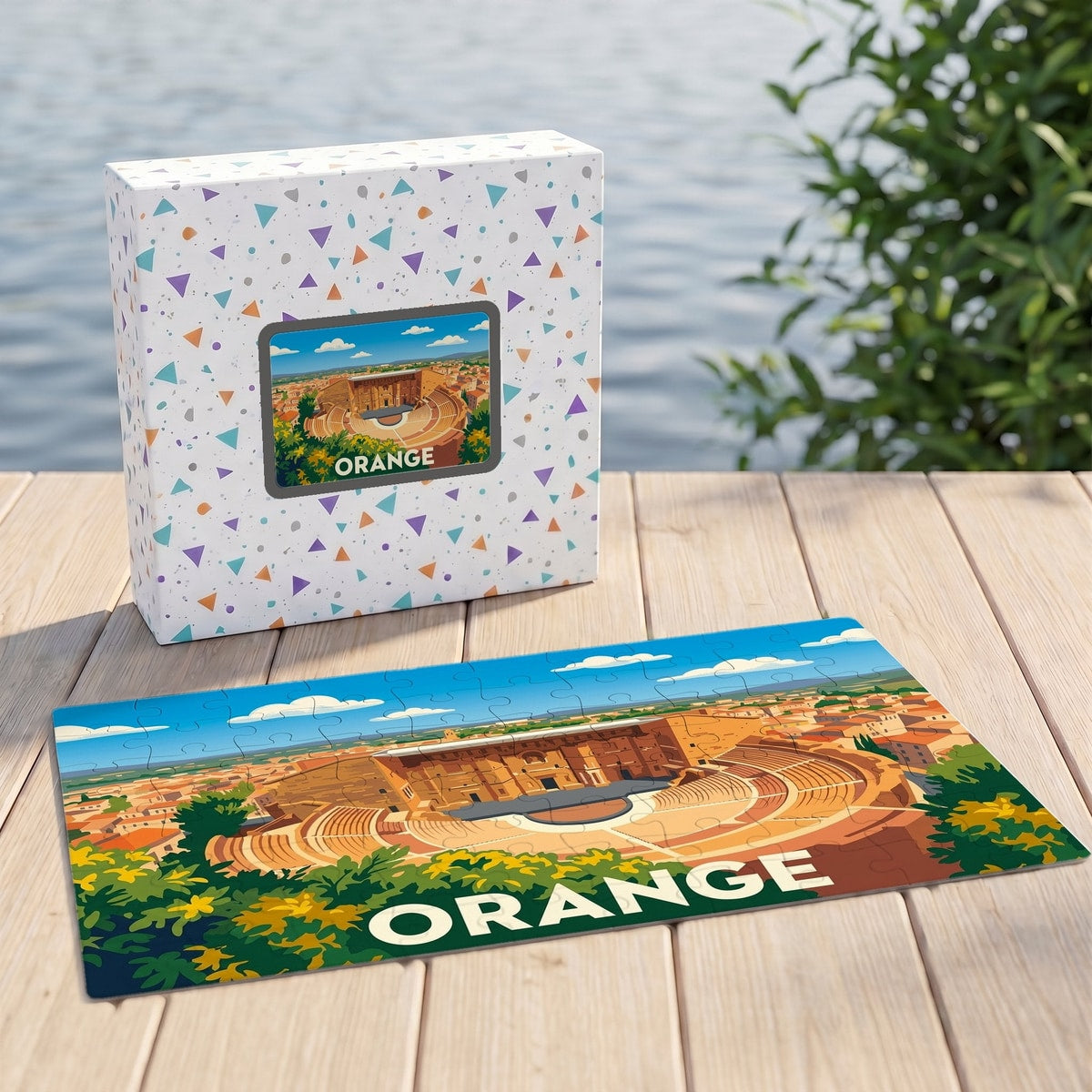 Puzzle souvenir de la ville d'Orange représentant son théâtre antique dans un style illustré.