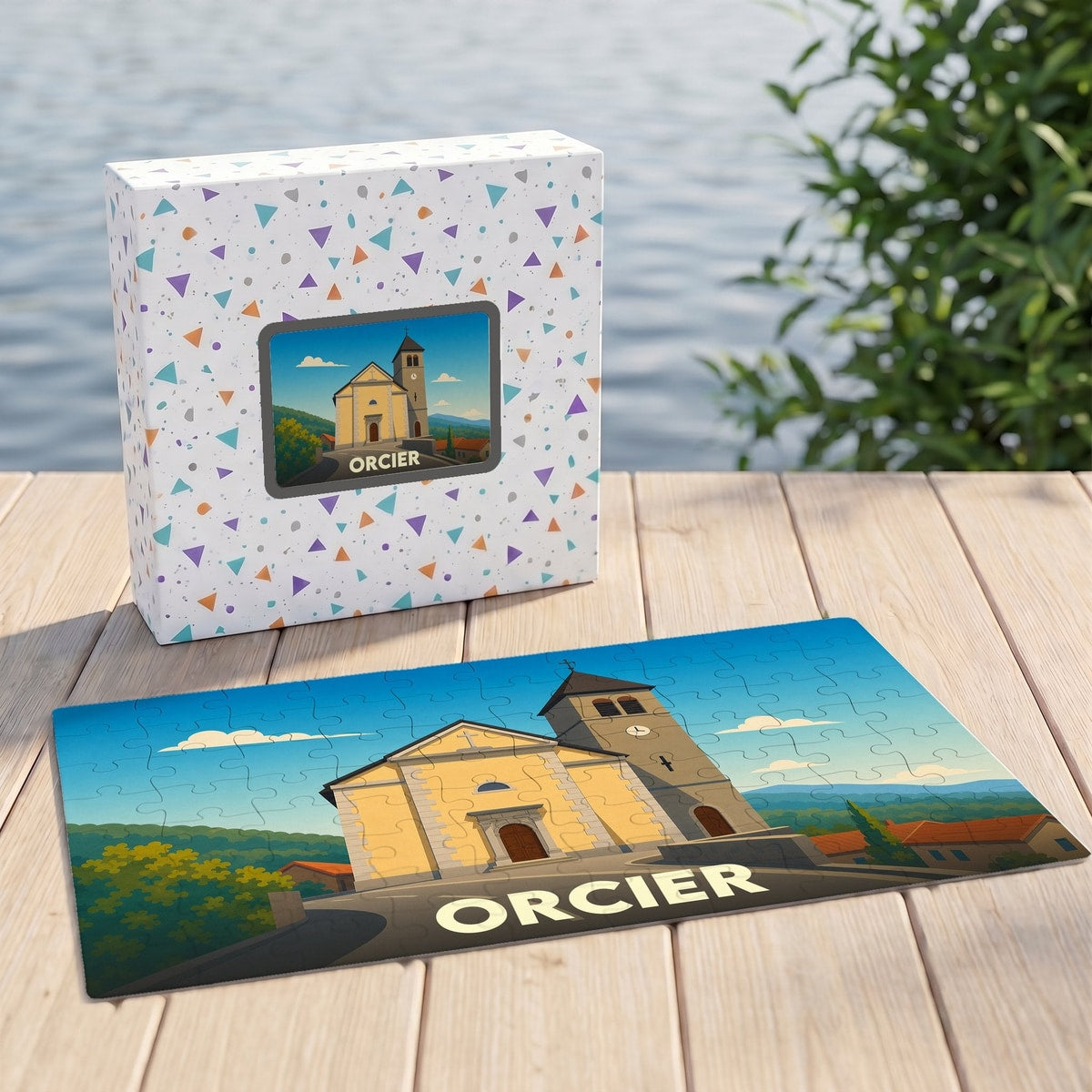 Puzzle souvenir de la ville d'Orcier présentant une illustration stylisée d'une église sous un ciel bleu.