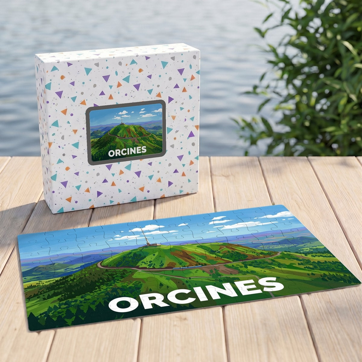 Puzzle souvenir de la ville d'Orcines avec une illustration stylisée du Puy de Dôme.