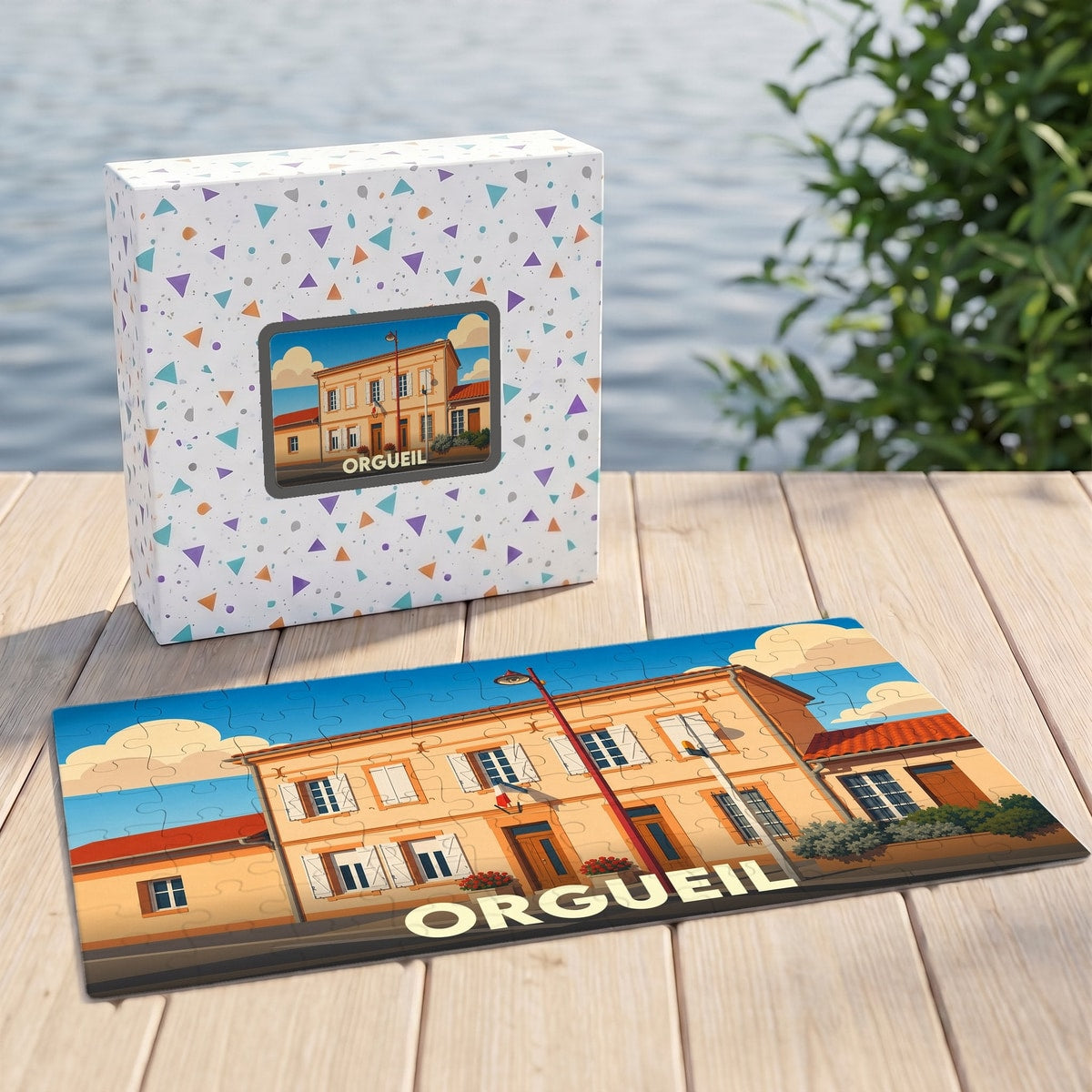 Puzzle souvenir de la ville d'Orgueil avec une illustration stylisée d'un bâtiment typique.