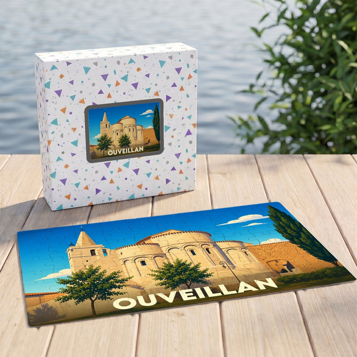 Puzzle souvenir de la ville d'Ouveillan présentant une illustration stylisée d'un monument historique local.