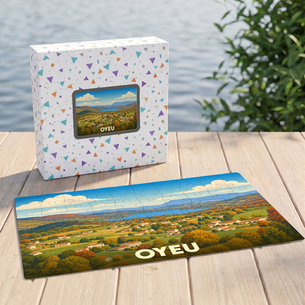 Puzzle souvenir de la ville d'Oyeu représentant un paysage vallonné aux couleurs automnales.