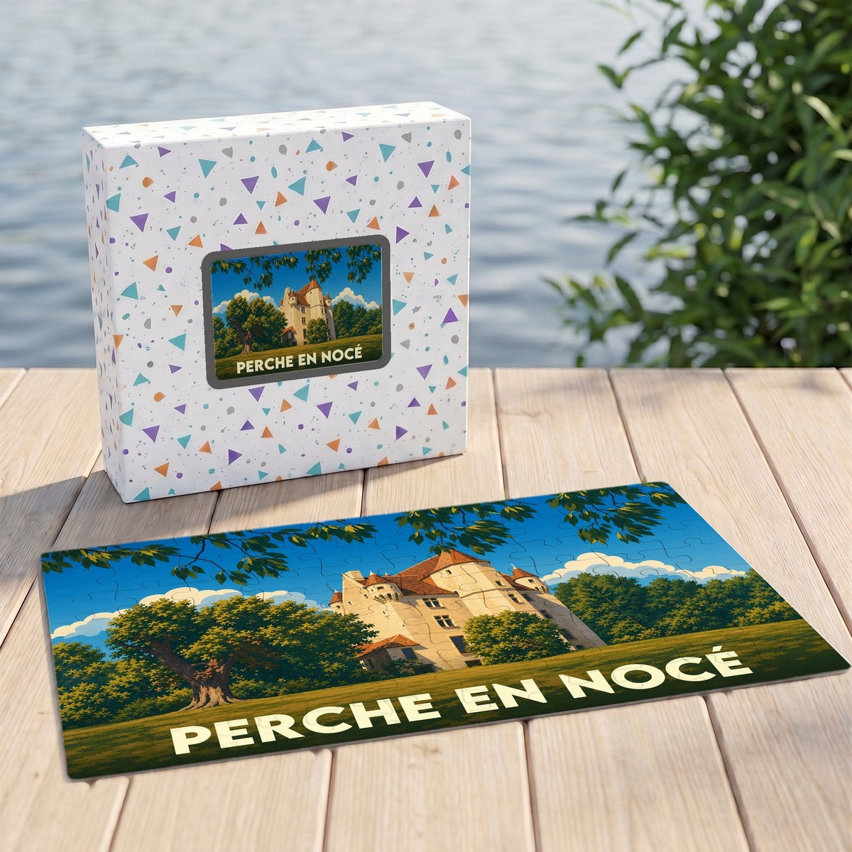 Puzzle souvenir de Perche en Nocé illustrant un château entouré de verdure dans un style vintage.