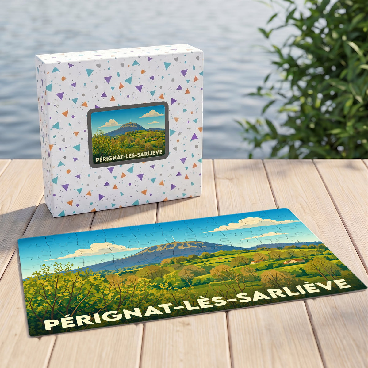 Puzzle souvenir de la ville de Pérignat-lès-Sarliève avec une illustration stylisée de son paysage volcanique.