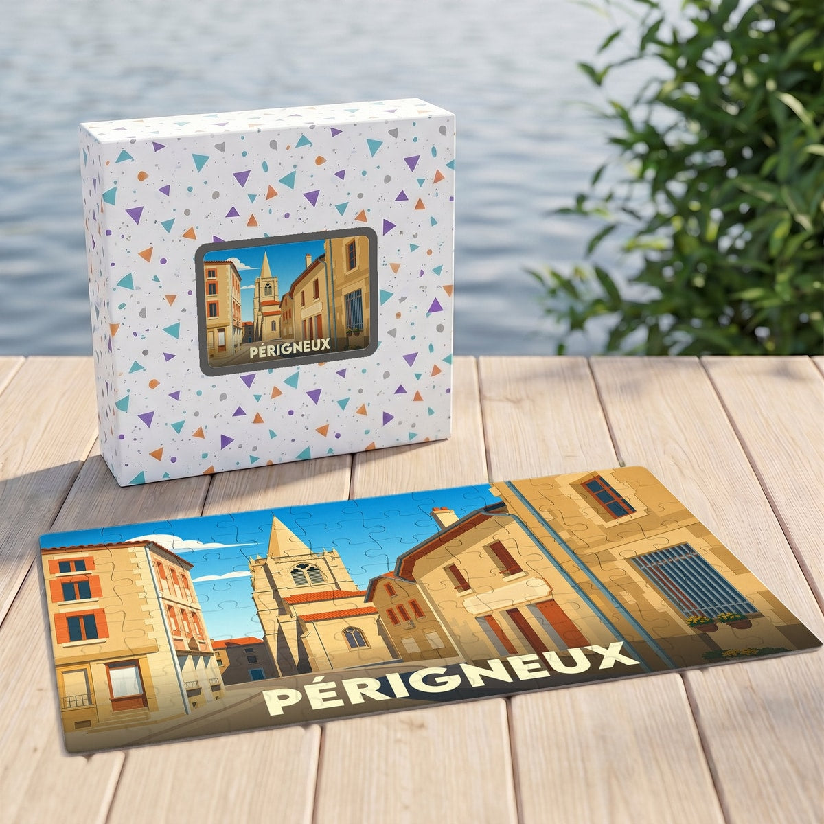 Puzzle souvenir de la ville de Périgneux avec une illustration stylisée et sa boîte assortie.