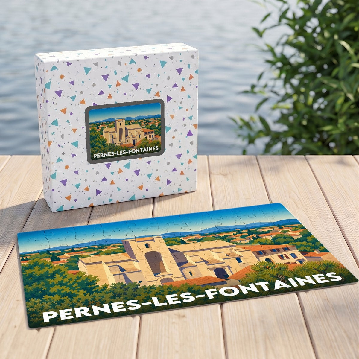 Puzzle souvenir de la ville de Pernes-les-Fontaines avec une illustration stylisée et colorée.