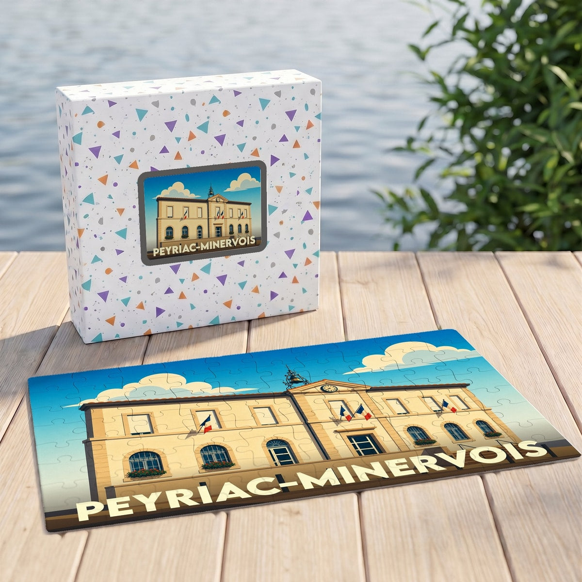 Puzzle souvenir de la ville de Peyriac-Minervois avec son illustration stylisée et sa boîte assortie.
