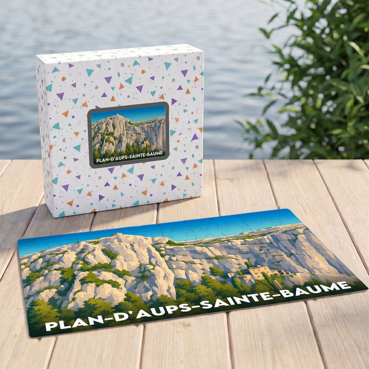 Puzzle souvenir de la ville de Plan-d'Aups-Sainte-Baume avec une illustration de ses falaises et sa boîte assortie.