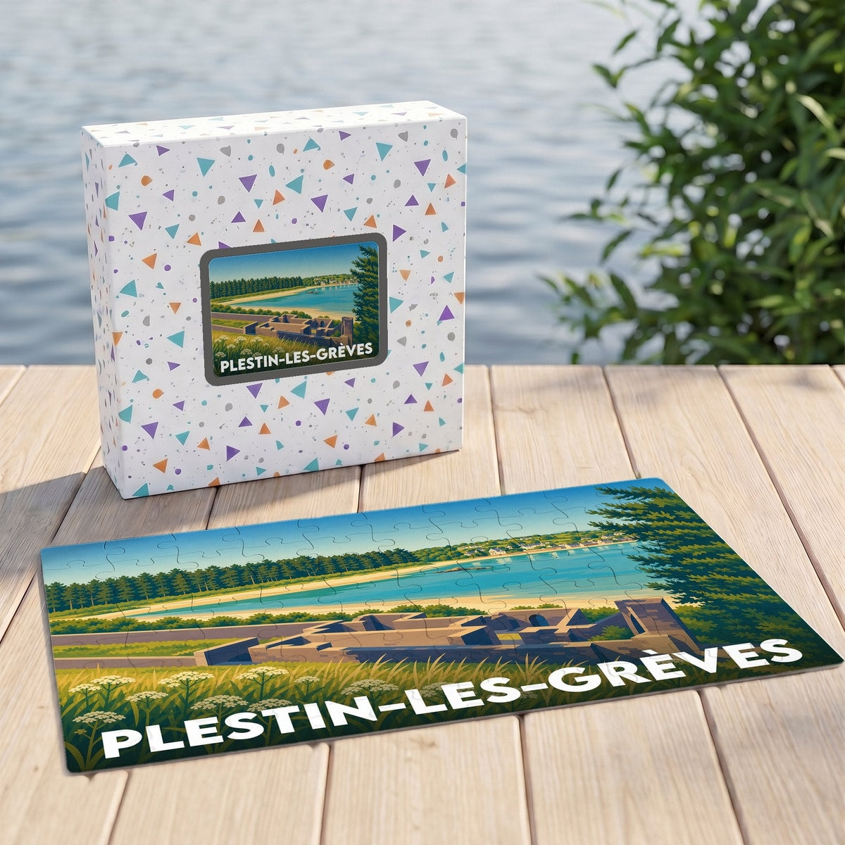 Puzzle souvenir de la ville de Plestin-les-Grèves avec son illustration de paysage côtier stylisé.