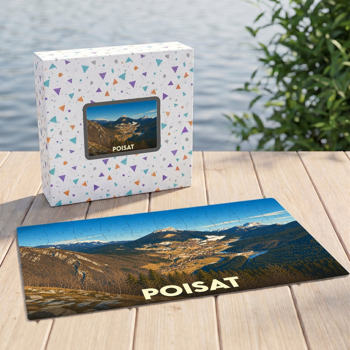 Puzzle souvenir de la ville de Poisat avec une illustration de paysage montagneux.