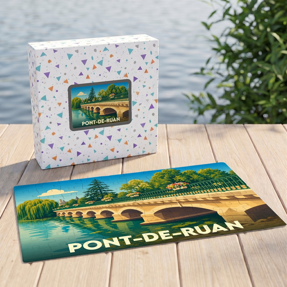 Puzzle souvenir de la ville de Pont-de-Ruan avec une illustration stylisée d'un pont de pierre.