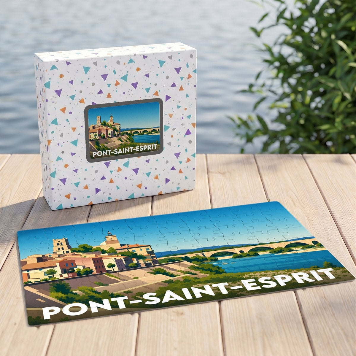 Puzzle souvenir de la ville de Pont-Saint-Esprit avec une illustration stylisée et colorée.