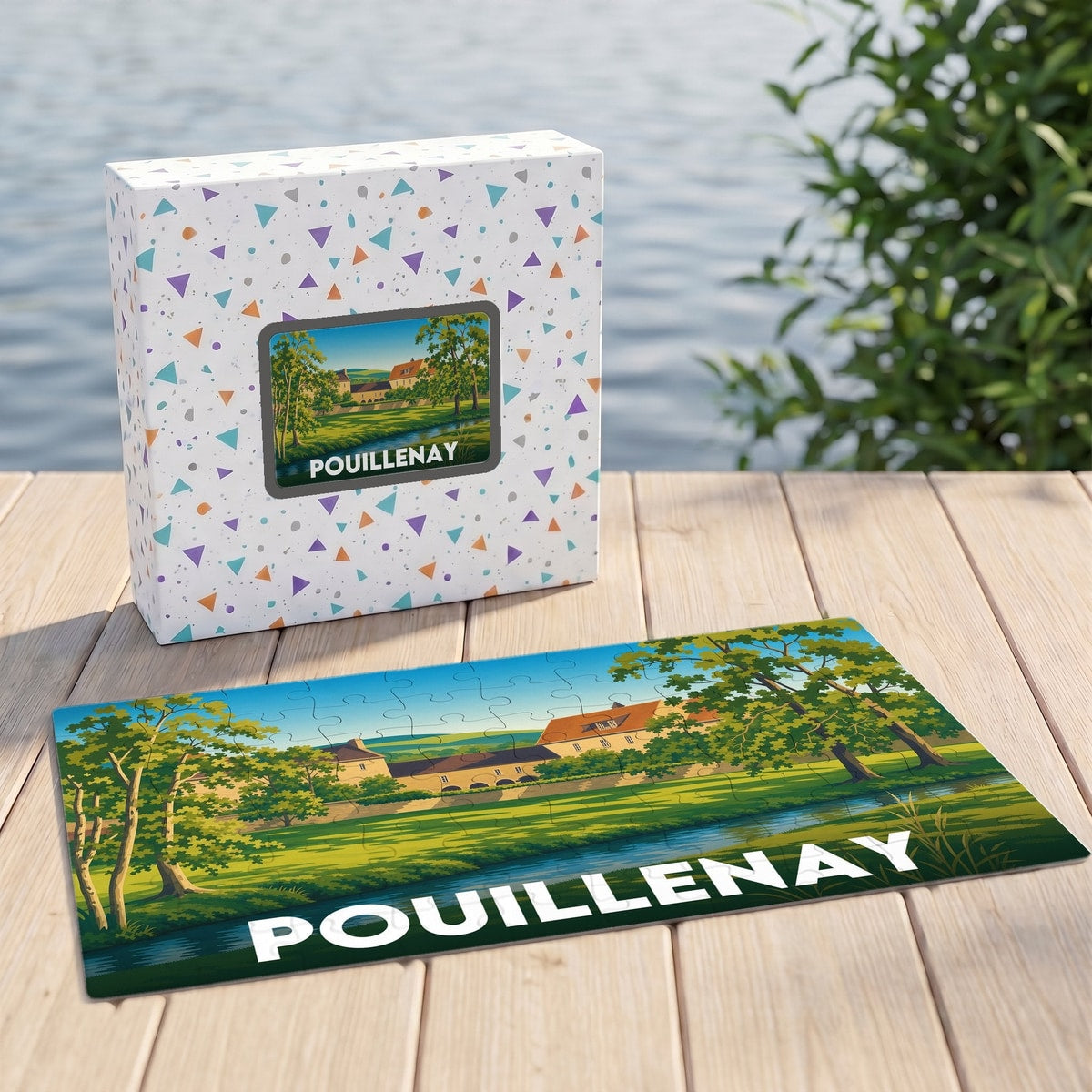 Puzzle souvenir de la ville de Pouillenay avec une illustration paysagère stylisée.