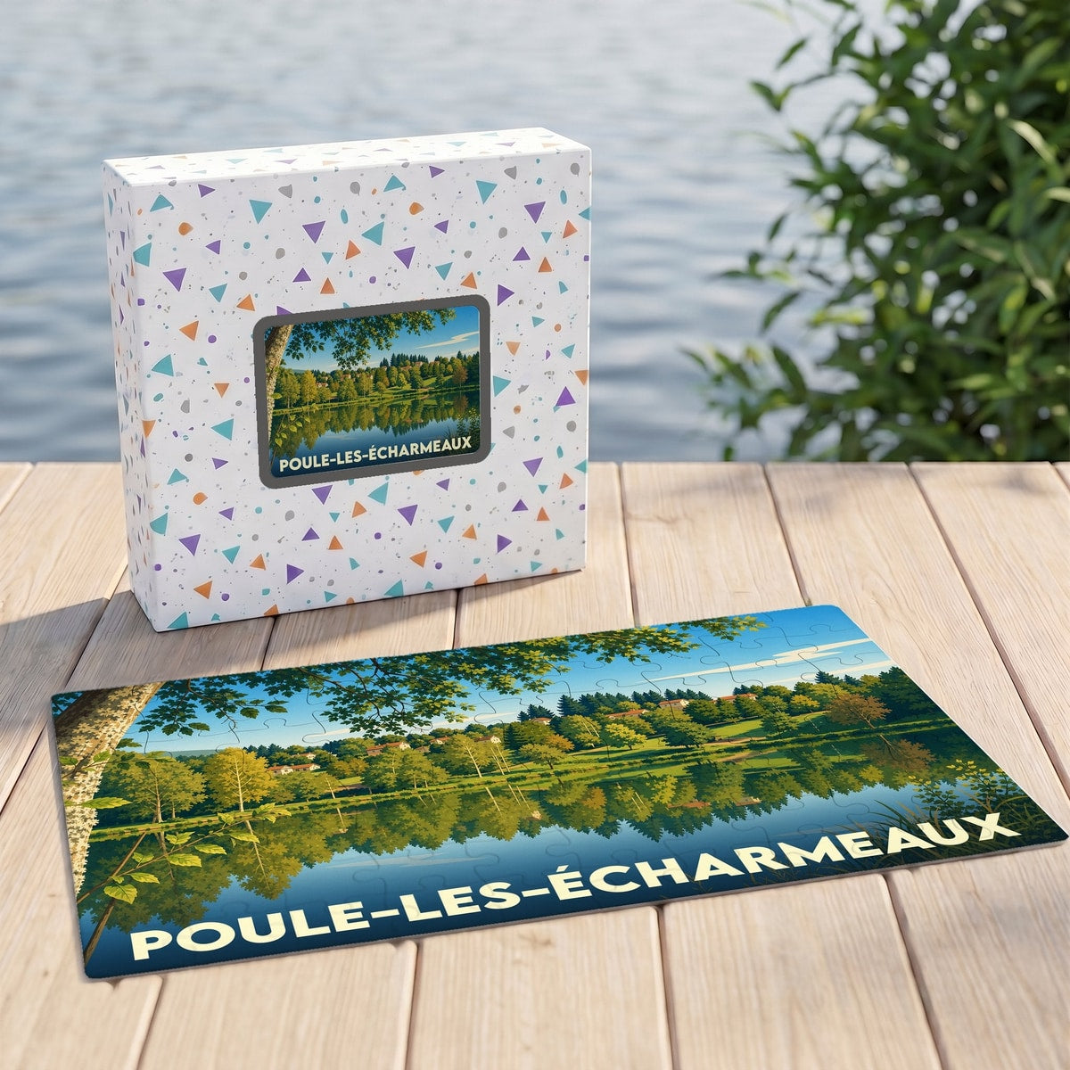 Puzzle souvenir de la ville de Poule-les-Écharmeaux illustrant un paysage de lac et de forêt.