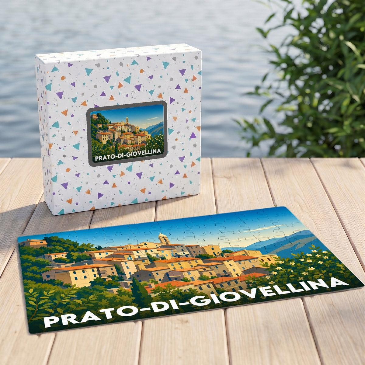 Puzzle souvenir de la ville de Prato-di-Giovellina avec son coffret illustré d'un paysage stylisé.