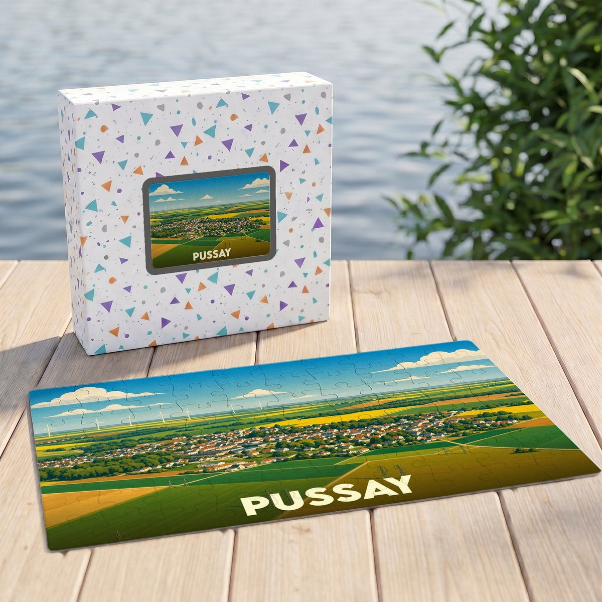 Puzzle souvenir de la ville de Pussay avec une illustration paysagère stylisée.