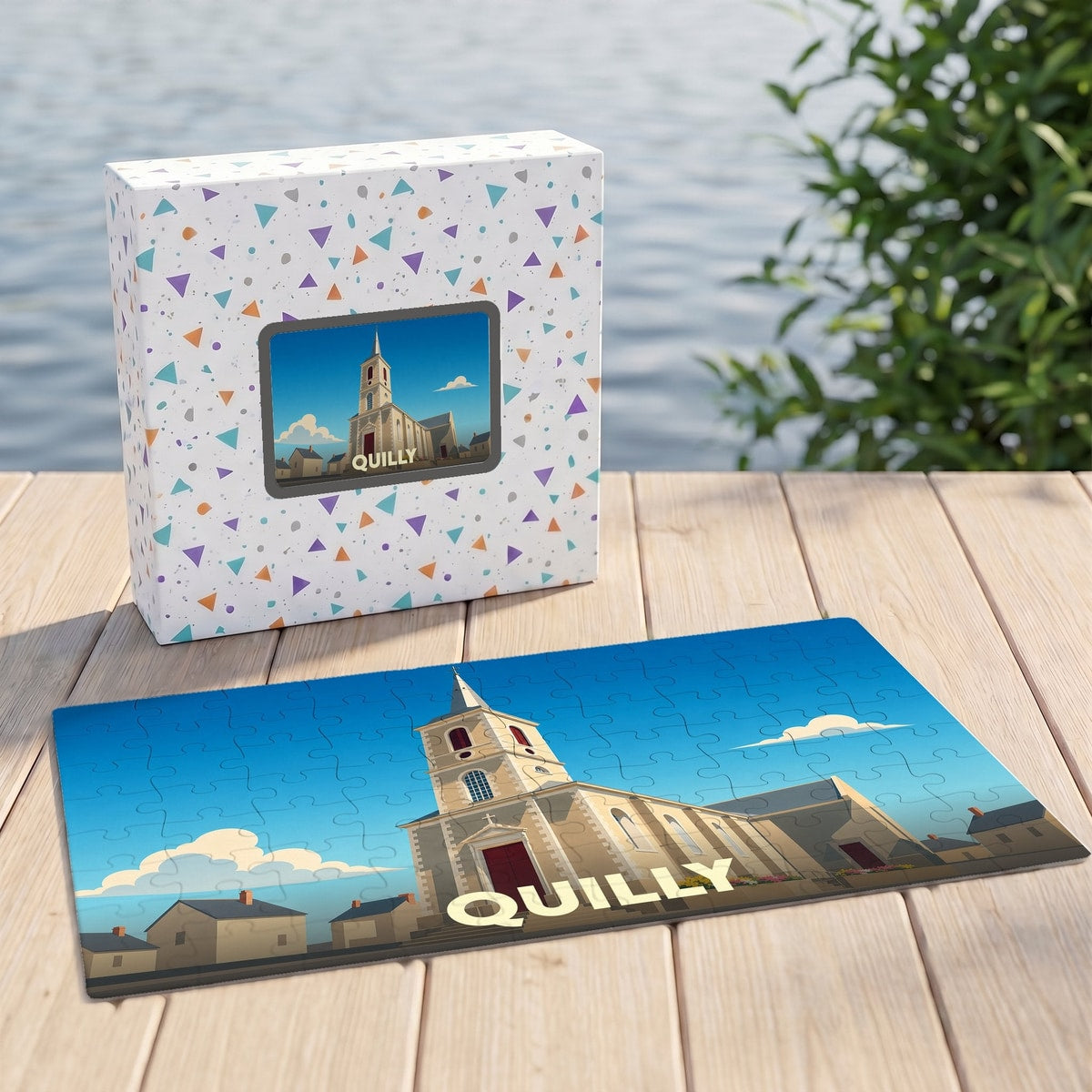 Puzzle souvenir de la ville de Quilly avec une illustration stylisée d'une église sur fond de ciel bleu.