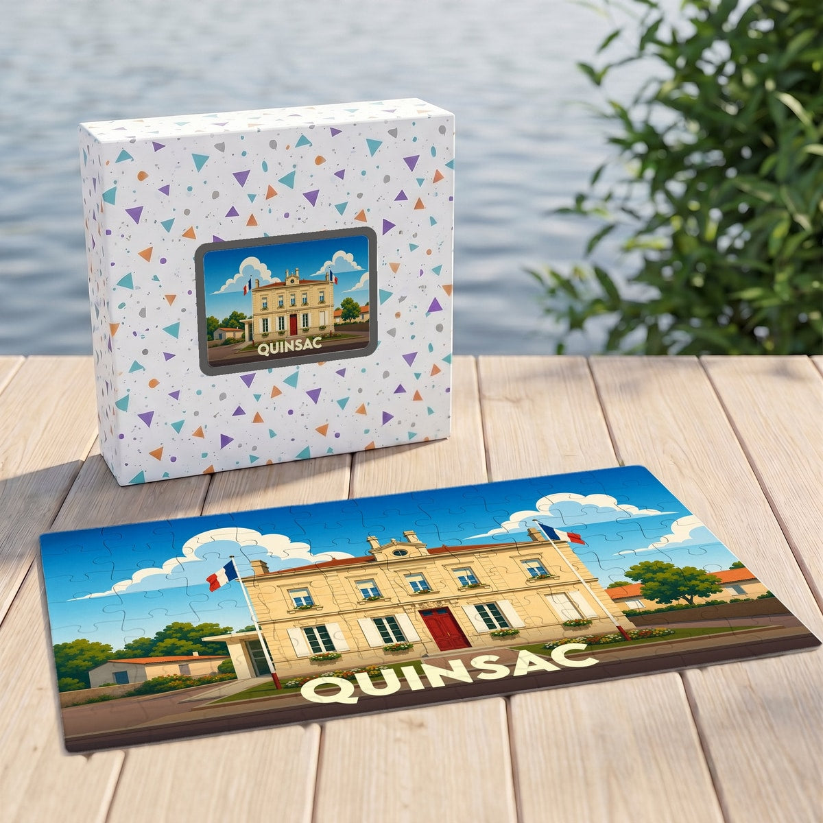 Puzzle souvenir de la ville de Quinsac avec une illustration stylisée de sa mairie.