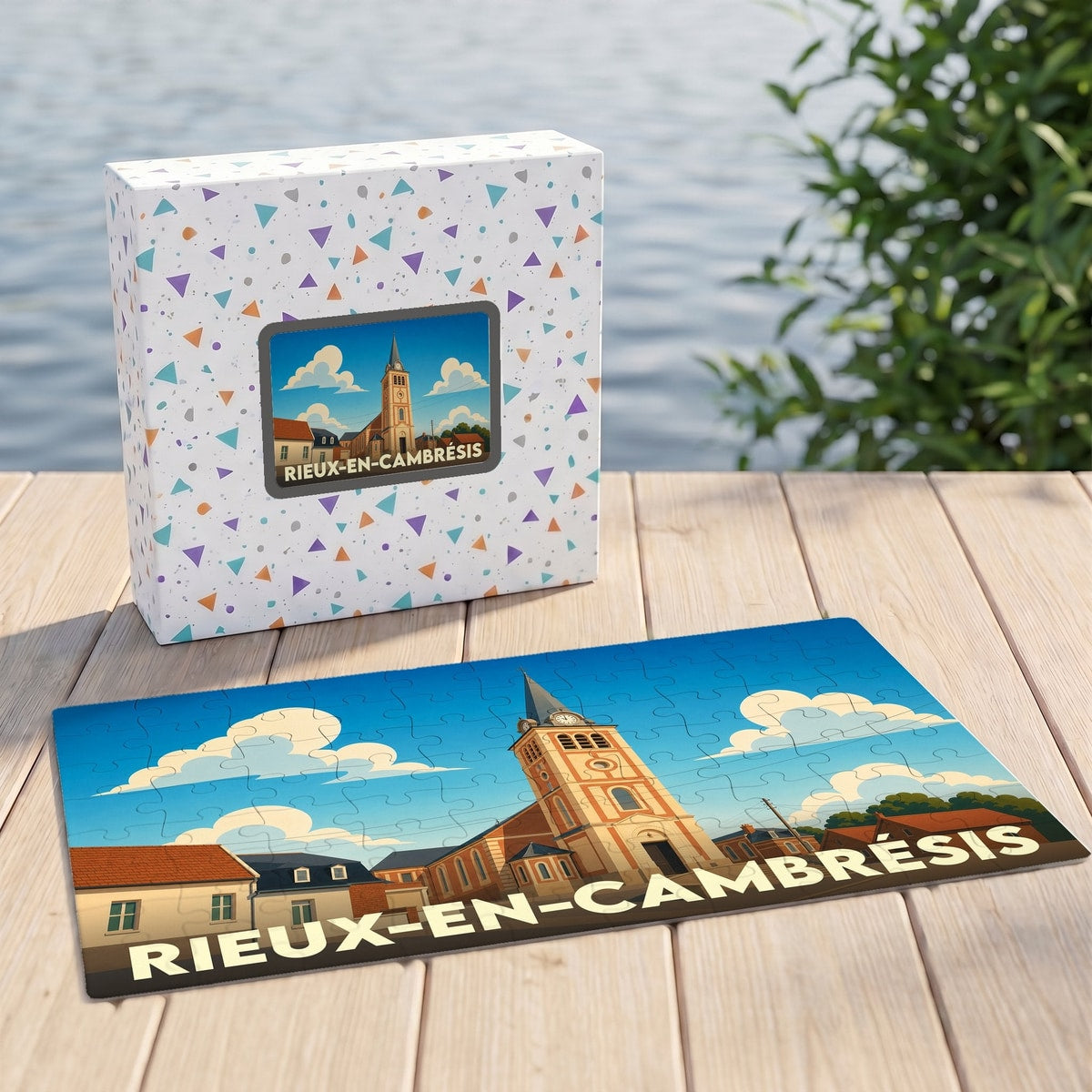 Puzzle souvenir de la ville de Rieux-en-Cambrésis avec une illustration stylisée d'une église sous un ciel nuageux.