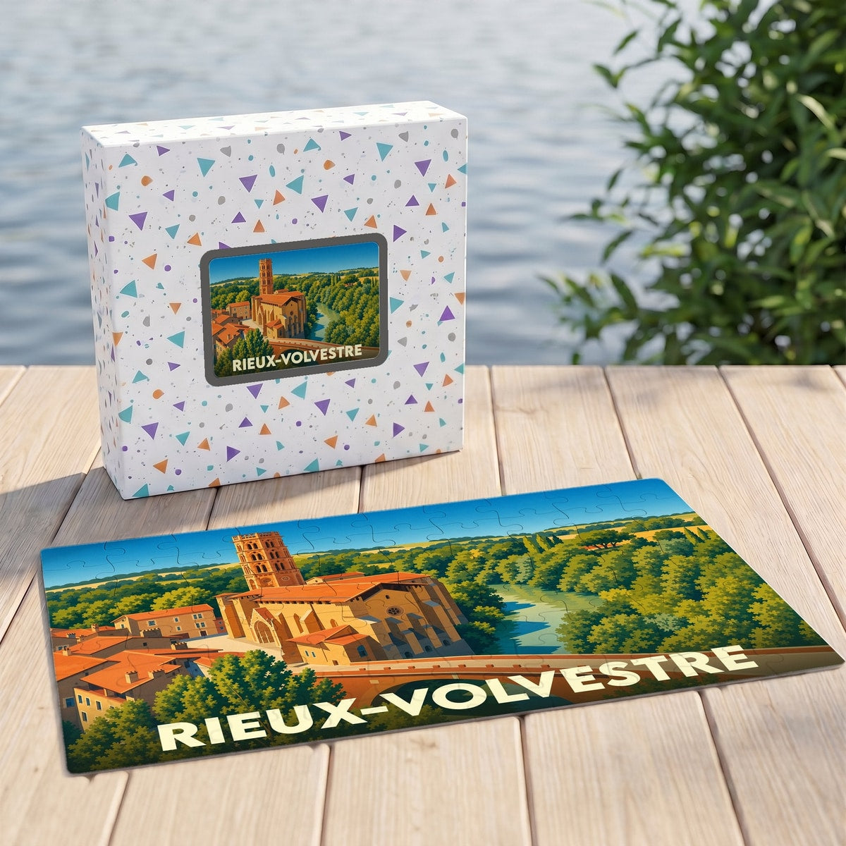 Puzzle souvenir de la ville de Rieux-Volvestre avec une illustration panoramique stylisée.
