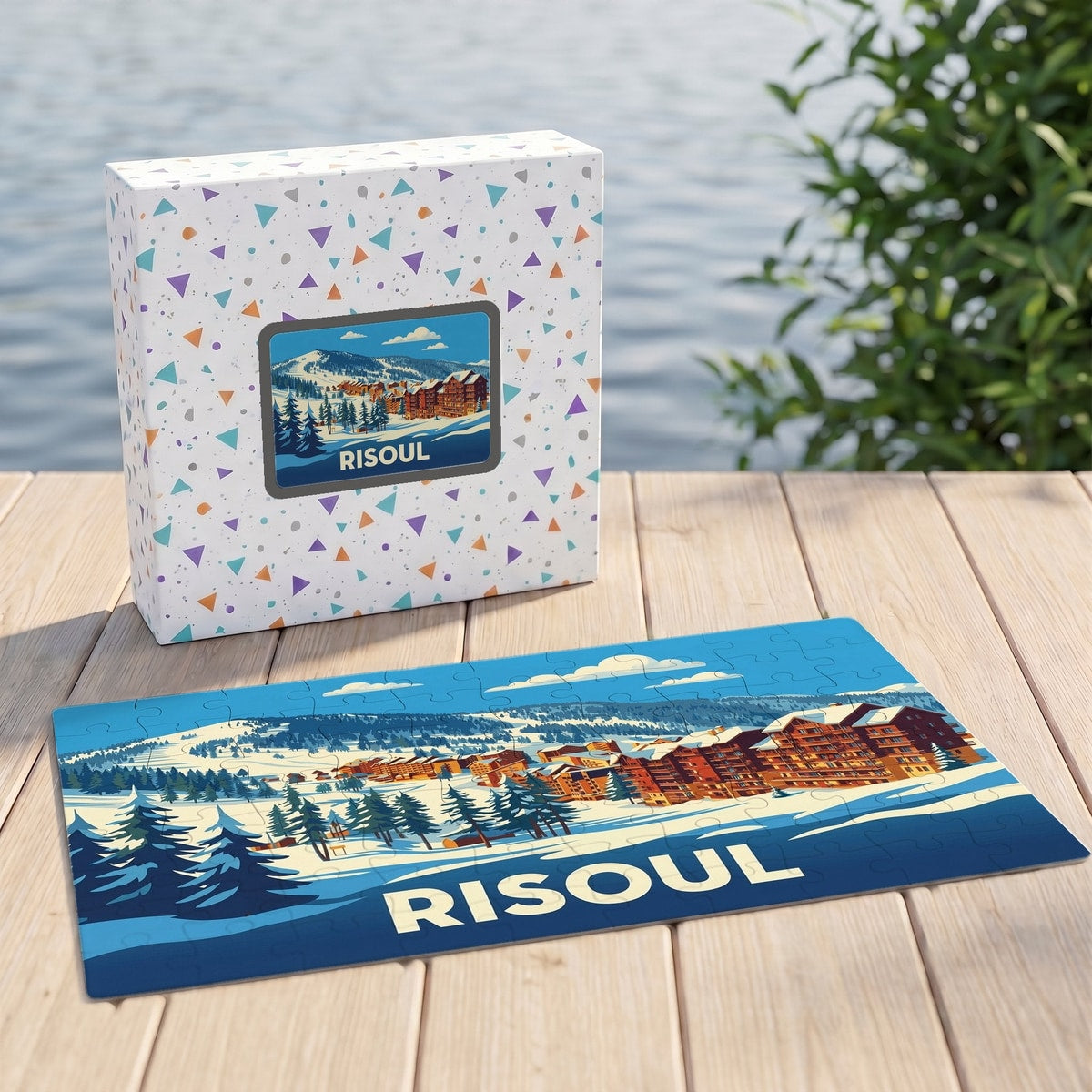 Puzzle souvenir de la ville de Risoul illustré d'un paysage de montagne enneigé et de ses chalets.