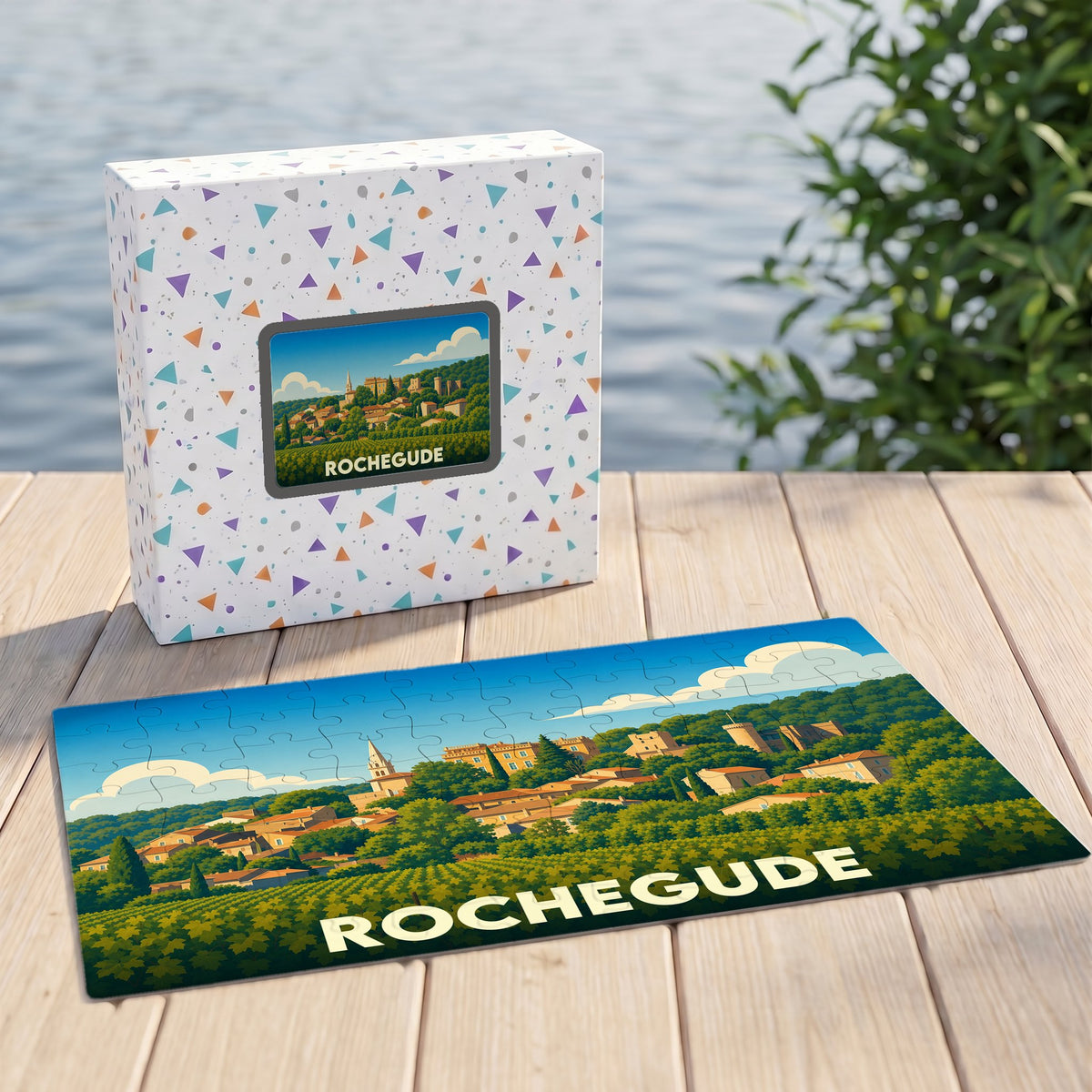 Puzzle souvenir de la ville de Rochegude avec une illustration stylisée d'un paysage provençal.