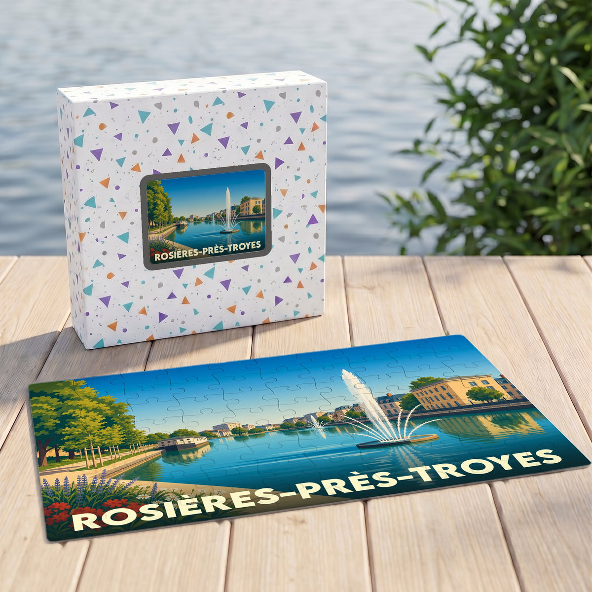 Puzzle souvenir de la ville de Rosières-près-Troyes avec une illustration stylisée d'un plan d'eau et de ses fontaines.