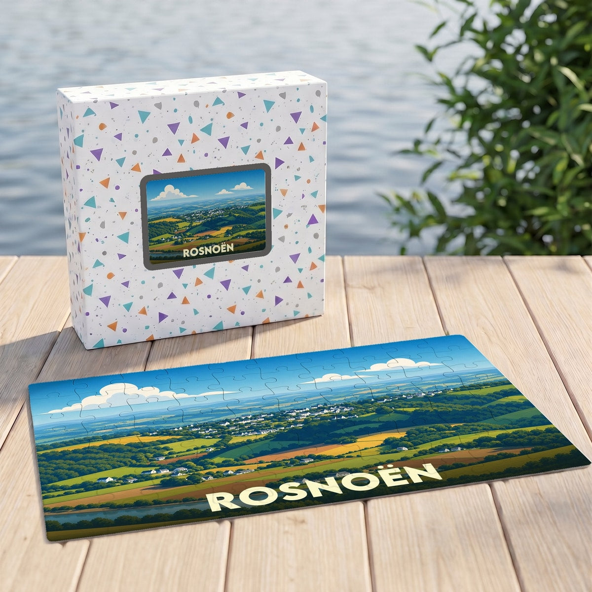Puzzle souvenir de la ville de Rosnoën avec une illustration de paysages vallonnés.