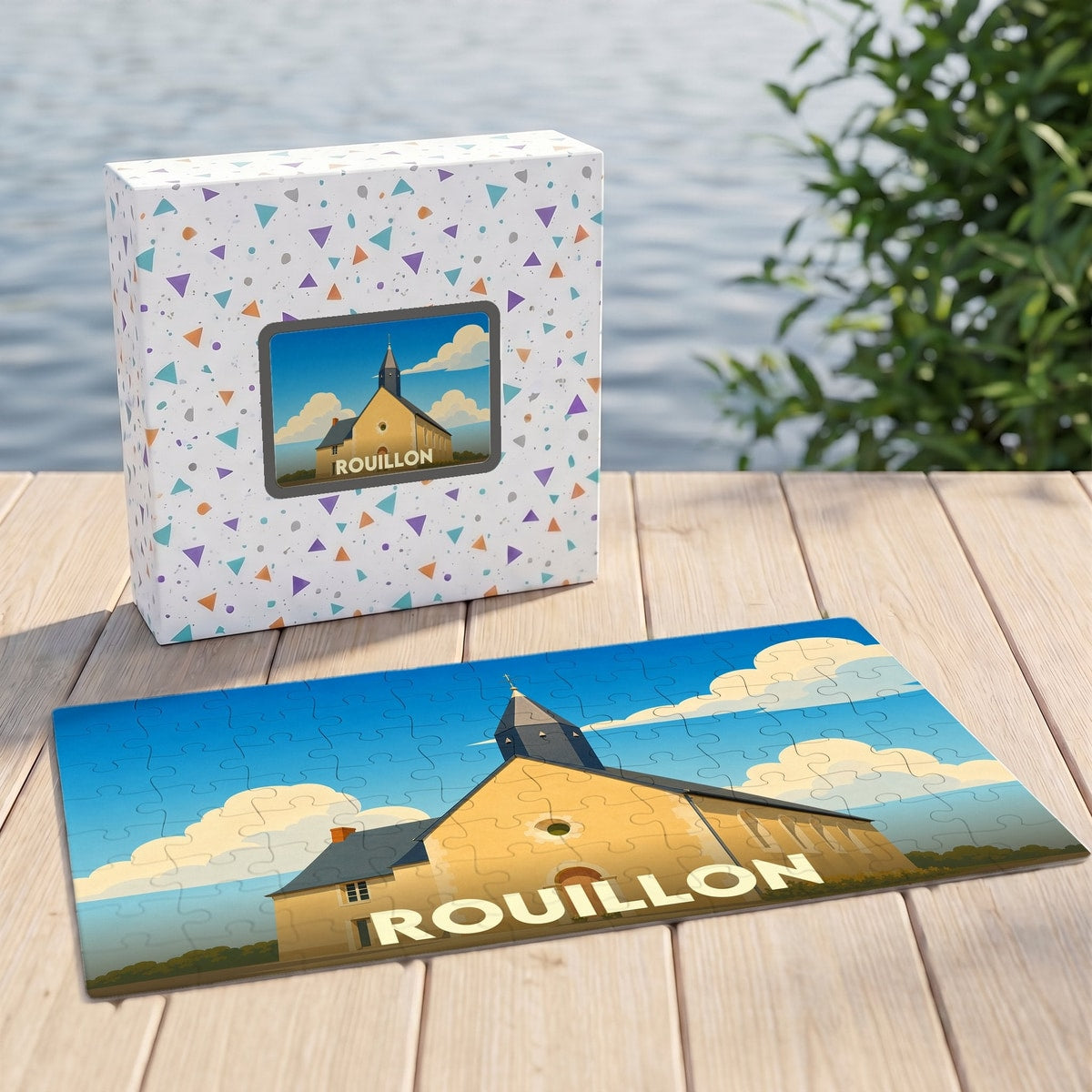 Puzzle souvenir de la ville de Rouillon avec une illustration stylisée de son église.