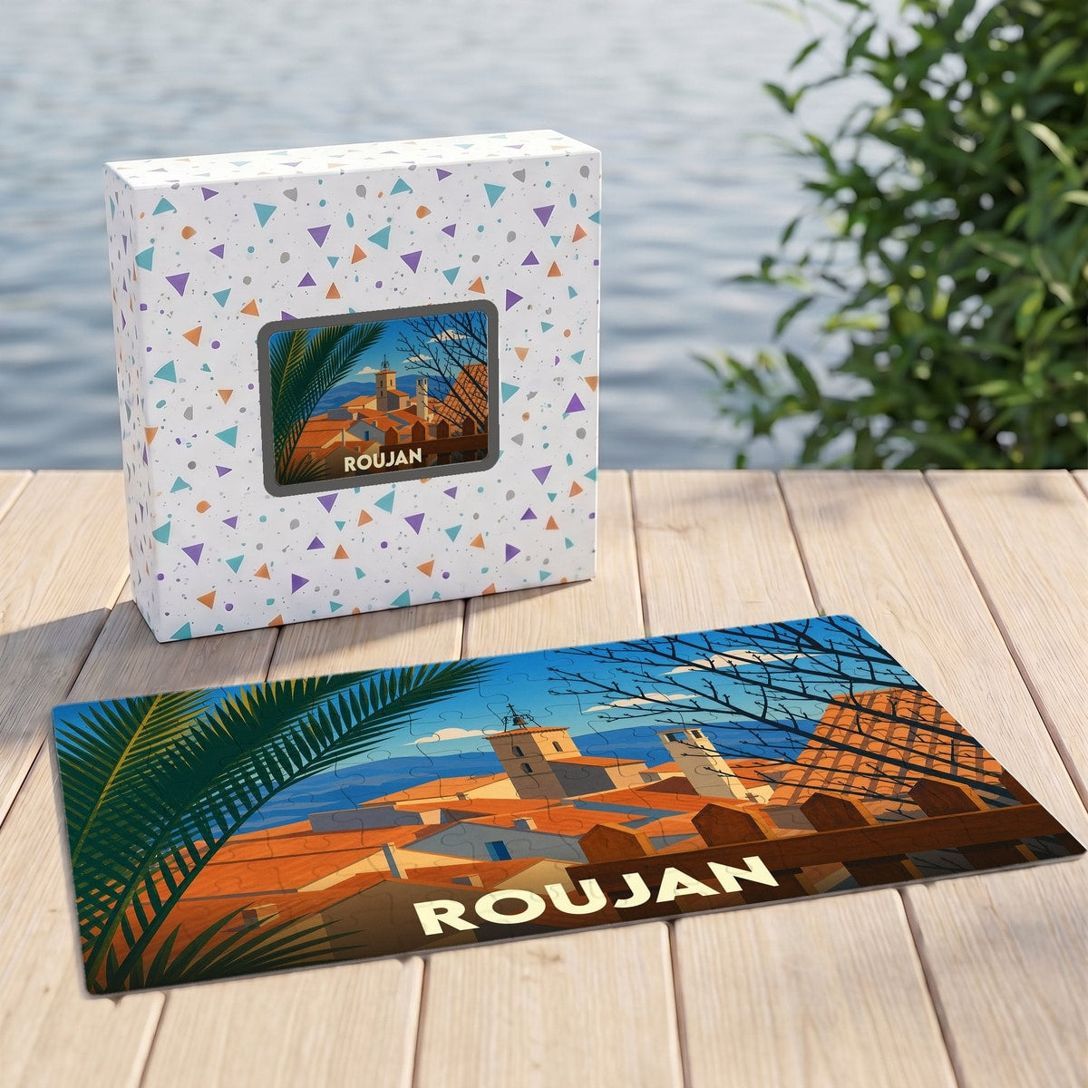 Puzzle souvenir de la ville de Roujan avec une illustration stylisée et colorée.