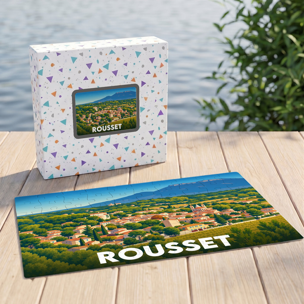 Puzzle souvenir de la ville de Rousset avec une illustration stylisée d'un paysage provençal.