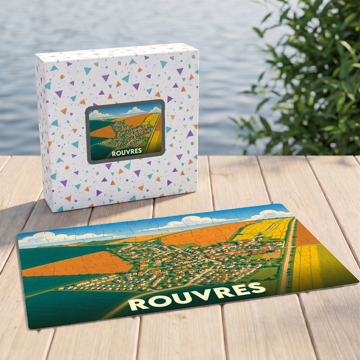 Puzzle souvenir de la ville de Rouvres avec une illustration stylisée de ses paysages et habitations.