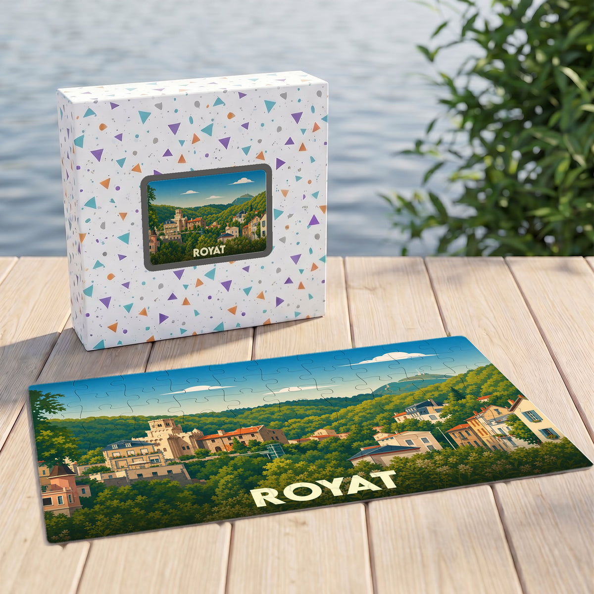 Puzzle souvenir de la ville de Royat présentant une illustration stylisée de son paysage urbain et verdoyant.