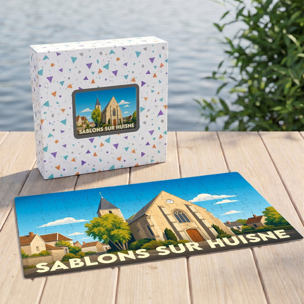 Puzzle souvenir de la ville de Sablons sur Huisne avec une illustration stylisée de son église.