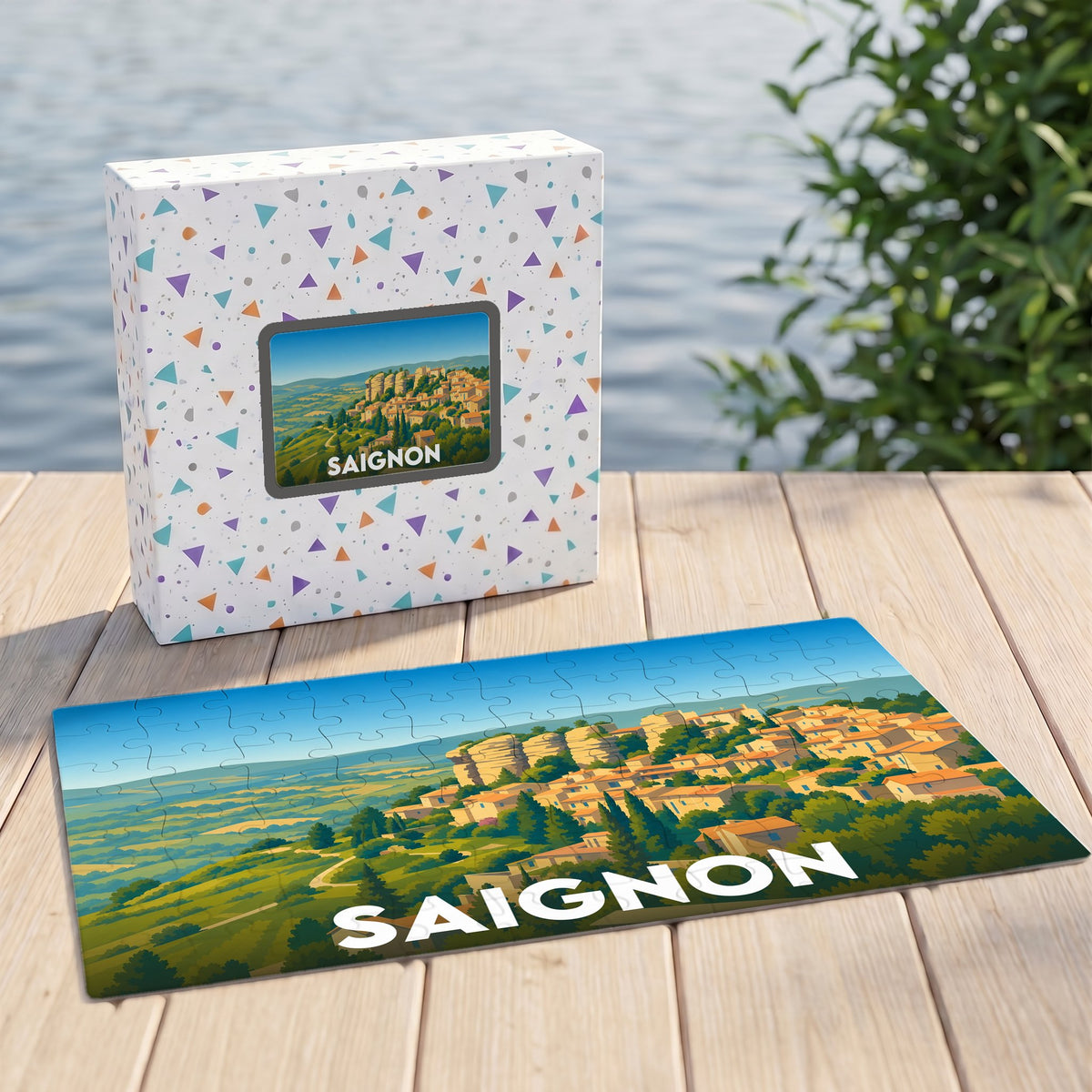 Puzzle souvenir de la ville de Saignon avec une illustration paysagère stylisée.