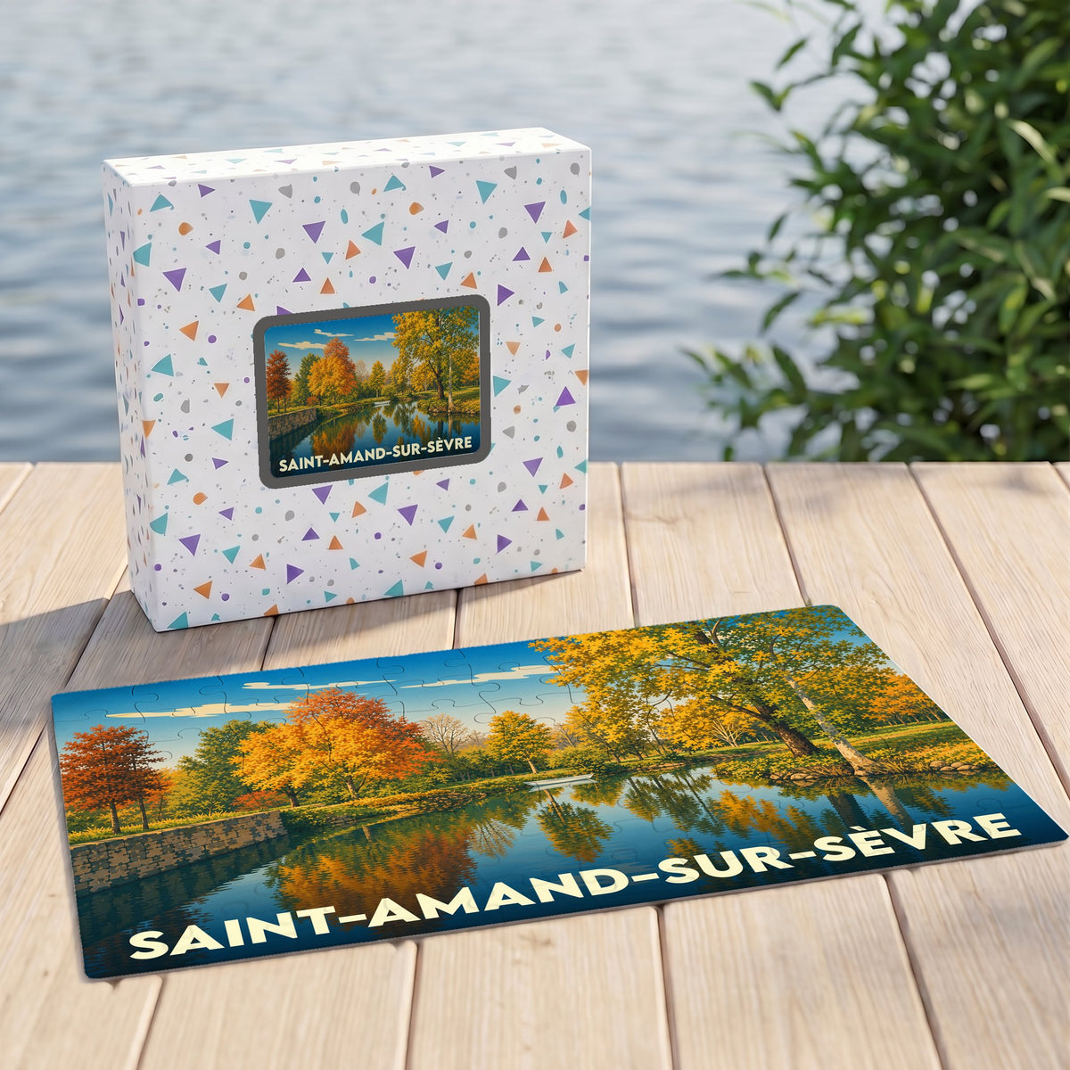 Puzzle souvenir de la ville de Saint-Amand-sur-Sèvre illustrant un paysage automnal au bord de l'eau.