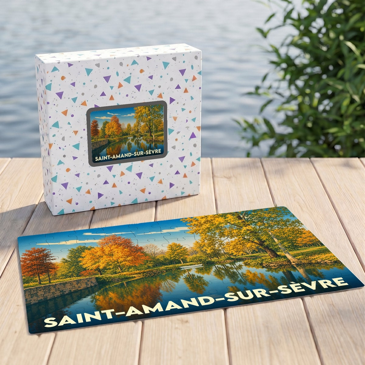 Puzzle souvenir de la ville de Saint-Amand-sur-Sèvre illustrant un paysage automnal au bord de l'eau.