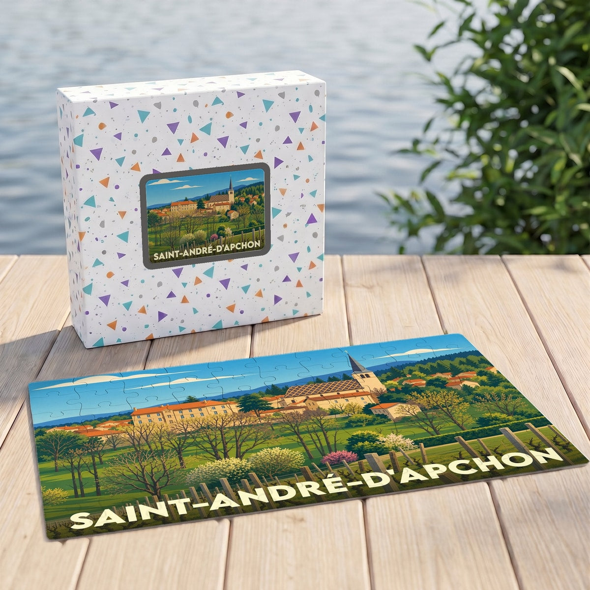 Puzzle souvenir de la ville de Saint-André-d'Apchon avec une illustration de son paysage urbain et de son église.