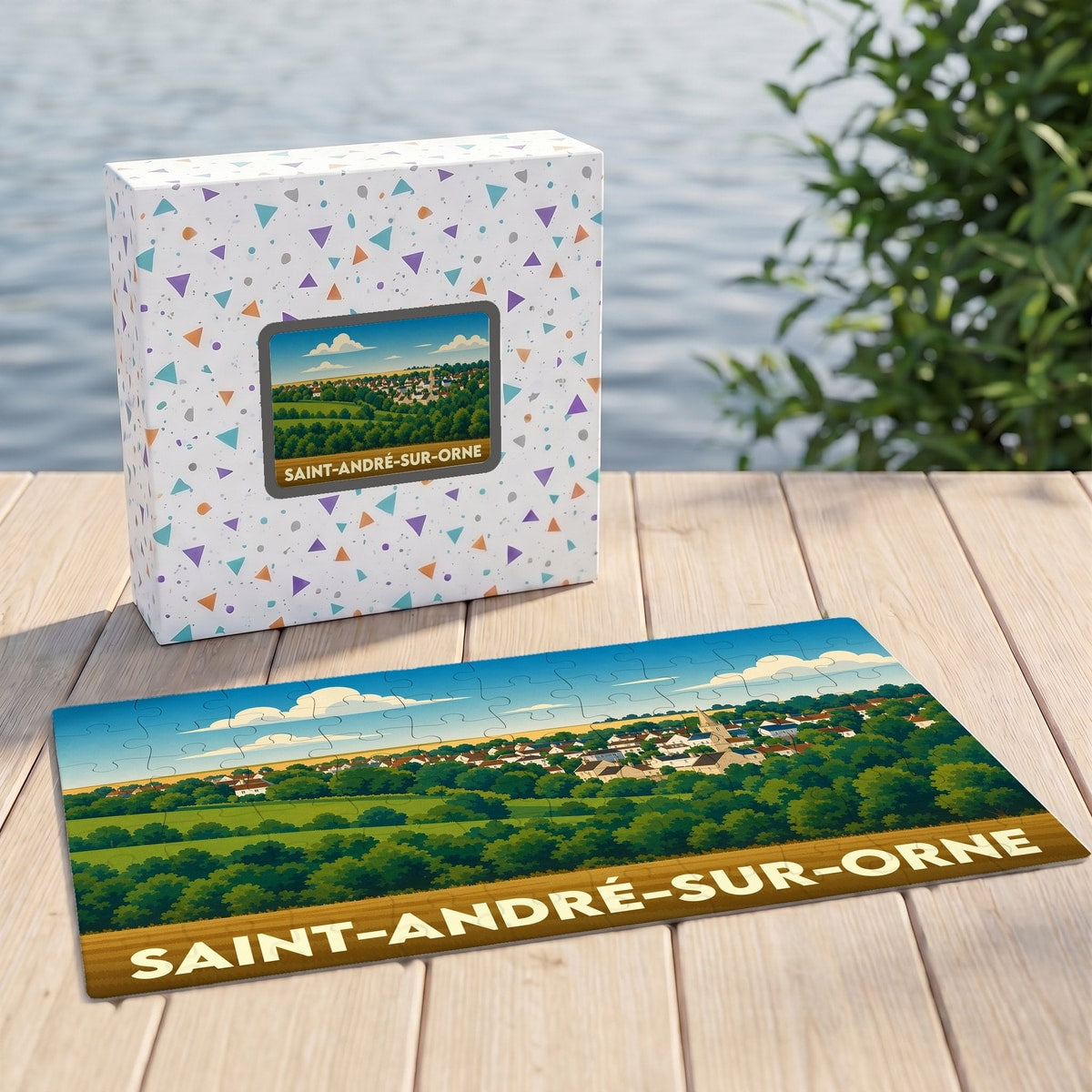 Puzzle souvenir de la ville de Saint-André-sur-Orne avec une illustration stylisée d'un paysage normand.