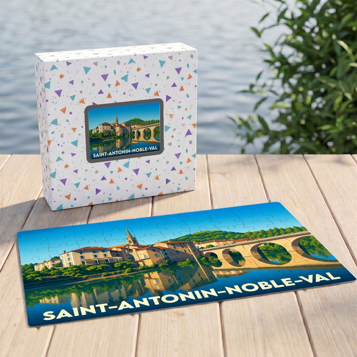Puzzle souvenir de la ville de Saint-Antonin-Noble-Val avec une illustration stylisée de son pont et de son bord de rivière.