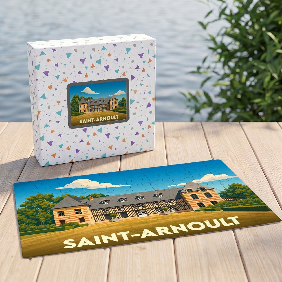 Puzzle souvenir de la ville de Saint-Arnoult avec une illustration stylisée d'un manoir normand.
