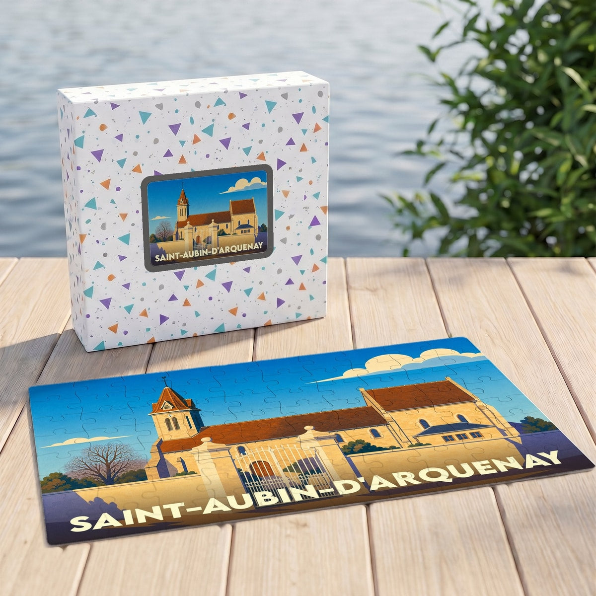 Puzzle souvenir de la ville de Saint-Aubin-d'Arquenay avec une illustration stylisée de son église.