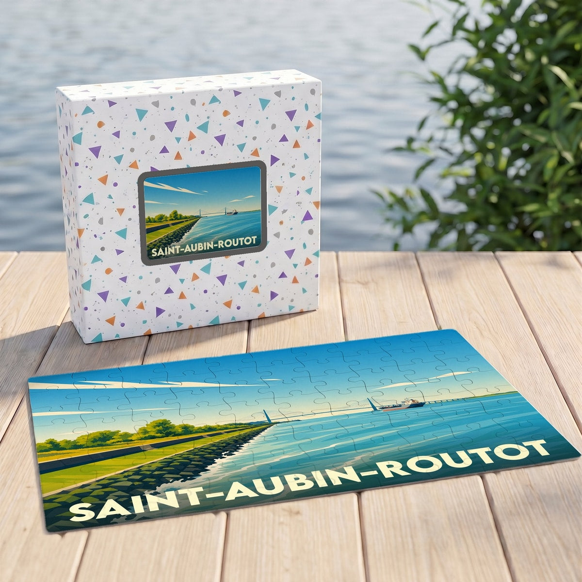 Puzzle souvenir de la ville de Saint-Aubin-Routot avec son boîtier, illustrant un paysage maritime stylisé.