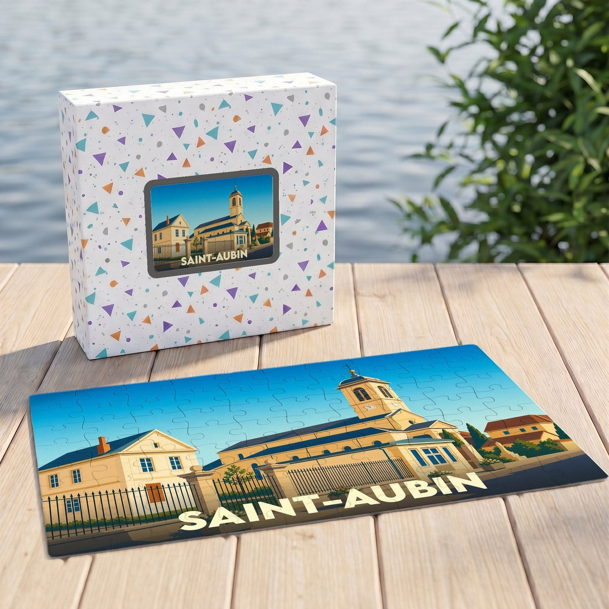 Puzzle souvenir de la ville de Saint-Aubin avec une illustration stylisée d'une église sous un ciel bleu.