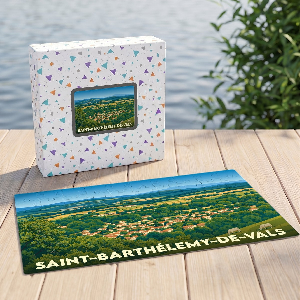 Puzzle souvenir de la ville de Saint-Barthélemy-de-Vals avec une illustration paysagère stylisée.